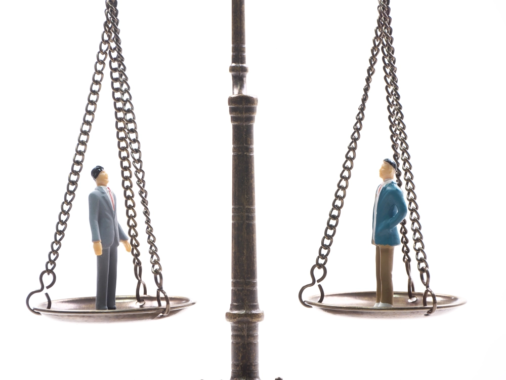 Balance symbolisant les honoraires d'un avocat pénaliste